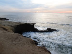 Sunset bluffs and foamy ocean