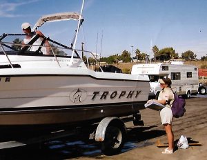 Fisheries Technician asking fisherman on boat questions