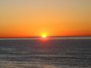 sun setting down Ocean La Jolla