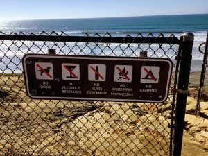 North Ponto Beach Rules Sign Fence