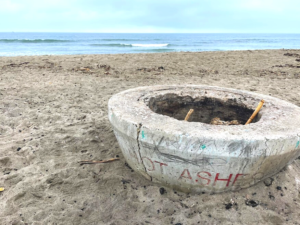 Trestles bonfire ring sand ocean sky